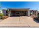 Charming single-story home with covered parking and well-maintained desert landscaping at 215 N Power Rd # 361, Mesa, AZ 85205