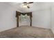 Bright main bedroom with neutral carpet and bay window at 215 N Power Rd # 361, Mesa, AZ 85205