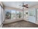 This sun room features an abundance of light and a ceiling fan at 215 N Power Rd # 361, Mesa, AZ 85205