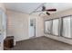 This sun room features an abundance of light and a ceiling fan at 215 N Power Rd # 361, Mesa, AZ 85205