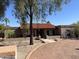 Single-story home with terracotta tile roof and landscaped front yard at 3824 E Kachina Dr, Phoenix, AZ 85044