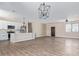 Modern kitchen features white cabinets and a large kitchen island at 6300 N 419Th Ave, Tonopah, AZ 85354