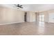 Spacious living room with tile floors and neutral color palette at 6300 N 419Th Ave, Tonopah, AZ 85354