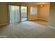 Spacious dining area with sliding door access to a patio at 7550 N 12Th St # 143, Phoenix, AZ 85020