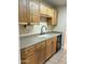 Bright kitchen featuring ample cabinetry and a double sink at 7550 N 12Th St # 143, Phoenix, AZ 85020