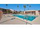 Refreshing community pool with lounge chairs at 7550 N 12Th St # 143, Phoenix, AZ 85020