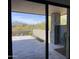 Spacious stone patio with desert views, a perfect spot for relaxation and enjoying the outdoors at 10336 E Chia Way, Scottsdale, AZ 85262