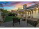Spacious backyard with patio, artificial turf, and fire pit at 2235 E Lakecrest Dr, Gilbert, AZ 85234