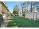 Large backyard with artificial grass and covered patio at 2235 E Lakecrest Dr, Gilbert, AZ 85234