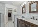Bathroom with double vanity, marble countertop, and subway tile at 2235 E Lakecrest Dr, Gilbert, AZ 85234