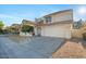 Two-story house with tile roof, landscaping, and driveway at 2235 E Lakecrest Dr, Gilbert, AZ 85234