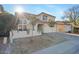 Two-story house with tile roof, attached garage, and landscaping at 2235 E Lakecrest Dr, Gilbert, AZ 85234