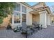 Exterior view of home with inviting patio and landscaping at 2235 E Lakecrest Dr, Gilbert, AZ 85234