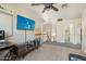 Game room featuring a large TV and comfortable seating at 2235 E Lakecrest Dr, Gilbert, AZ 85234