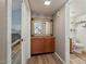 Hallway with built-in cabinet and granite countertop at 2235 E Lakecrest Dr, Gilbert, AZ 85234