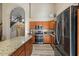 Spacious kitchen featuring granite countertops and modern appliances at 2235 E Lakecrest Dr, Gilbert, AZ 85234