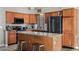 Modern kitchen with granite countertops and stainless steel appliances at 2235 E Lakecrest Dr, Gilbert, AZ 85234