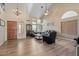 Spacious living room with vaulted ceiling and hardwood floors at 2235 E Lakecrest Dr, Gilbert, AZ 85234