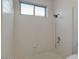 Shower stall with tiled walls and single shower head at 2534 S Grandview Ave, Tempe, AZ 85282