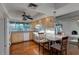 Bright kitchen, hardwood floors, and an island with seating at 2534 S Grandview Ave, Tempe, AZ 85282