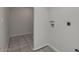 Small laundry room with washer and dryer hookups at 2534 S Grandview Ave, Tempe, AZ 85282