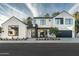 Two-story modern home with dark gray roof at 6338 N 10Th Dr, Phoenix, AZ 85013