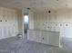 Spacious kitchen area prepped for appliances, including a breakfast bar, with natural light at 7631 W Tether Trl, Peoria, AZ 85383