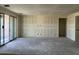 Large living area with sliding glass doors and ample space for customization and interior design at 7631 W Tether Trl, Peoria, AZ 85383