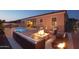 Relaxing backyard with fire pit and pool at 12866 S 183Rd Ave, Goodyear, AZ 85338