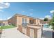 Outdoor kitchen and pool area with built-in grill at 12866 S 183Rd Ave, Goodyear, AZ 85338