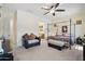 Main bedroom with ensuite bathroom and sitting area at 12866 S 183Rd Ave, Goodyear, AZ 85338