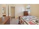Bright bedroom with double doors leading to closet and bathroom at 12866 S 183Rd Ave, Goodyear, AZ 85338