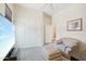 Bedroom with seating area and large closet at 12866 S 183Rd Ave, Goodyear, AZ 85338