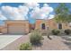 Front view of single-story home with desert landscaping at 12866 S 183Rd Ave, Goodyear, AZ 85338