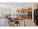 Spacious kitchen with island and stainless steel appliances at 12866 S 183Rd Ave, Goodyear, AZ 85338