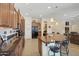 Kitchen with dark countertops and wooden cabinetry at 12866 S 183Rd Ave, Goodyear, AZ 85338