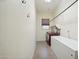 Laundry room with washer, dryer, and extra storage at 12866 S 183Rd Ave, Goodyear, AZ 85338