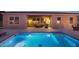Inviting blue pool with a turtle mosaic at 12866 S 183Rd Ave, Goodyear, AZ 85338