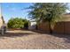 Spacious backyard with fruit trees, storage shed, and gravel at 21438 S 194Th St, Queen Creek, AZ 85142