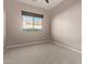 Bright bedroom featuring a window with blinds and carpet flooring at 21438 S 194Th St, Queen Creek, AZ 85142