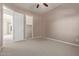 Spacious bedroom with carpet flooring and ample closet space at 21438 S 194Th St, Queen Creek, AZ 85142