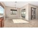 Breakfast nook with tile floor and sliding glass door access to backyard at 21438 S 194Th St, Queen Creek, AZ 85142