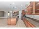 Kitchen with large island and stainless steel appliances at 21438 S 194Th St, Queen Creek, AZ 85142