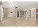 Open living room with tile floor and access to kitchen at 21438 S 194Th St, Queen Creek, AZ 85142