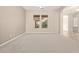 Bright and airy living room with carpeted floor at 21438 S 194Th St, Queen Creek, AZ 85142