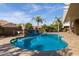 Inviting kidney-shaped pool with a stone water feature at 21438 S 194Th St, Queen Creek, AZ 85142