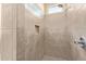 Clean shower with tile surround and glass block window at 21438 S 194Th St, Queen Creek, AZ 85142
