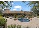 Aerial view of a luxurious backyard with a pool, spa, and expansive patio that is perfect for outdoor entertaining at 6322 E Turquoise Ave, Paradise Valley, AZ 85253