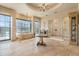 Spacious bathroom featuring a soaking tub, glass shower, and tile flooring at 6322 E Turquoise Ave, Paradise Valley, AZ 85253