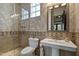 Elegant bathroom featuring a glass shower, decorative tile and a pedestal sink at 6322 E Turquoise Ave, Paradise Valley, AZ 85253